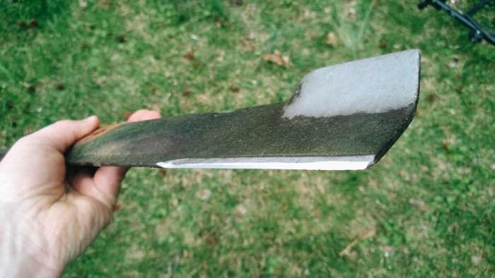 A rotary mower blade cuts by violently impacting the grass.